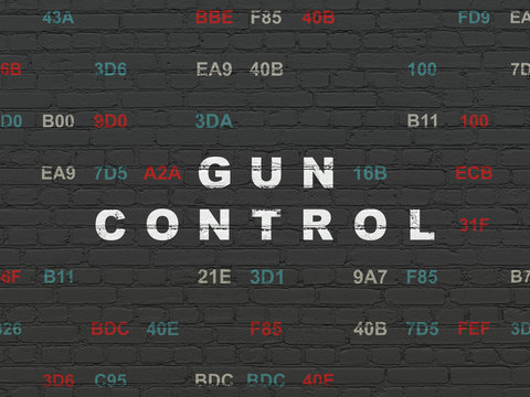Security concept: Gun Control on wall background