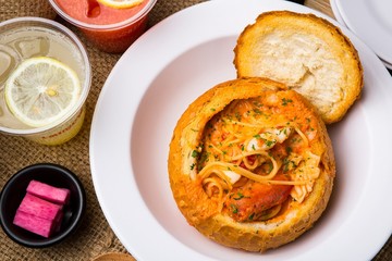 Pasta with rose Sauce in Bread