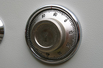 Combination lock on small home fire safe to protect documents and valuables from fire and burglary.