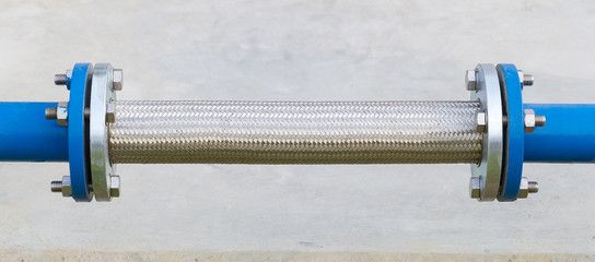 Flexible connector of steel pipe.
