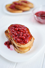 Homemade bread toast with berry jam  on a white background