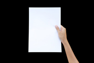 Woman hands holding sheet of paper isolated on black background.