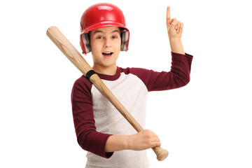 Joyful kid with baseball equipment pointing up © Ljupco Smokovski