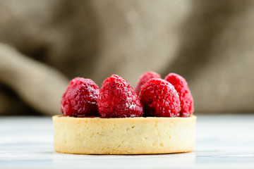home tartlet with raspberries closeup
