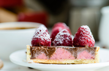 home tartlet with raspberries closeup