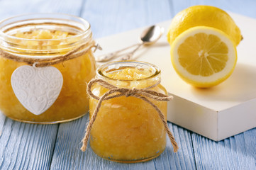 Homemade lemon jam in glass jars.