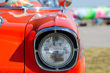 Closeup of old retro car headlight