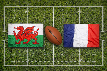 Wales vs. France flags on rugby field