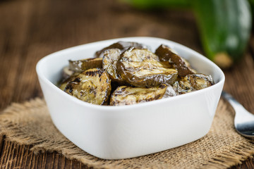 Grilled Zucchinis (selective focus) on vintage wooden background