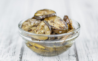 Grilled Zucchinis (selective focus) on vintage wooden background