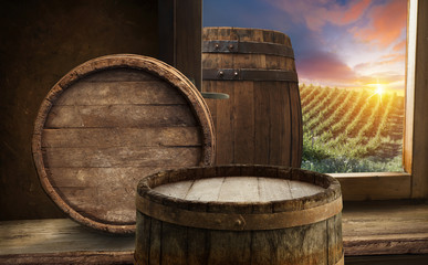 White wine with barrel on vineyard in Chianti, Tuscany, Italy