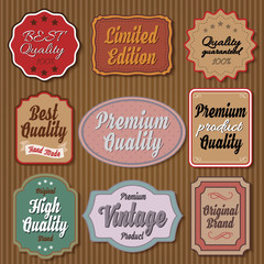 Set of vintage colourful badges on cardboard background  - 134004444
