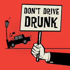 Poster in hand with car crash and text Don't Drive Drunk
