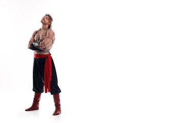 Actor Athlete man in trousers with naked torso training with chain on white background