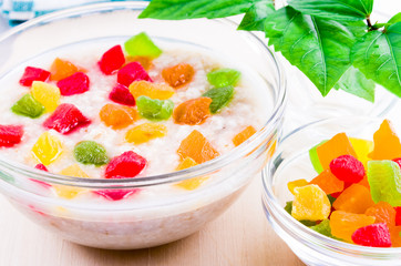 Healthy oat closeup with candied fruit