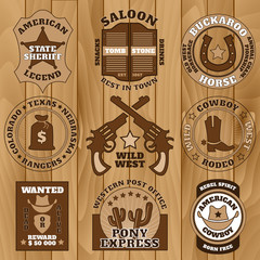 Vintage wild west badges on wooden background  - 134009200