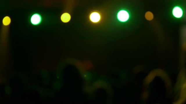 4K dancing crowd at party, out of focus