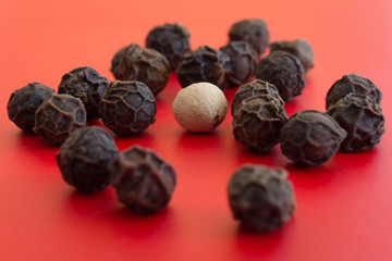 black and white peppercorns in macro 
