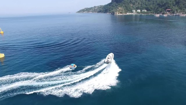 People Riding Banana and Bowrider Pulling them at Turunc, Marmaris