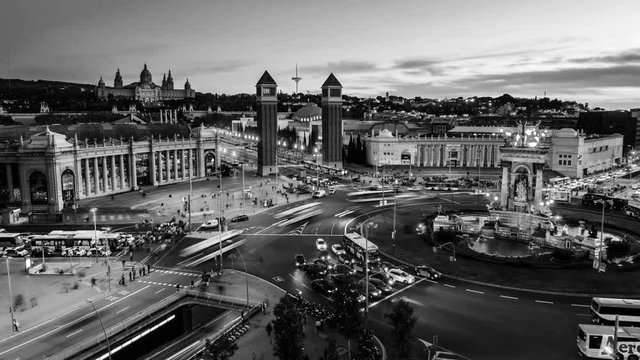 Barcelona, Spain time-lapse. Spanish Square aerial view in Barcelona, Spain. This is the famous place with traffic light trails, fountain and Venetian towers, and National museum. Black and white