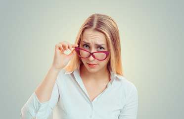 Skeptical woman looking at you