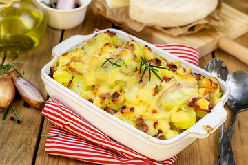 French dish Tartiflette with potatoes, reblochon cheese and baco