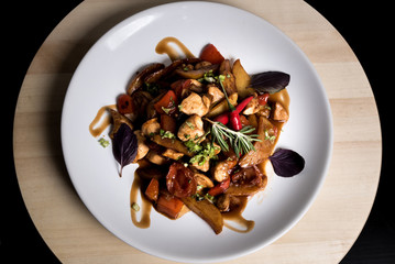Healthy eating vegetables meal in white plate on a wooden board. Top view