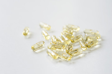 Capsule pills use in pharmaceutical manufacturing, drug, medicine, garlic oil, fish liver oil.