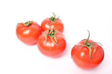 juicy tomatoes on white background