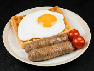 Fried Egg and Sausages on Waffles