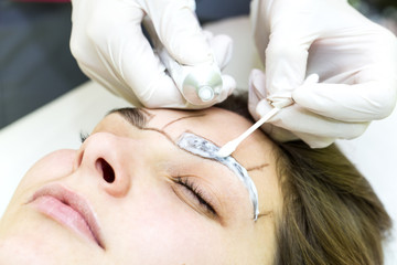 Naklejka premium Mikrobleyding eyebrows workflow in a beauty salon