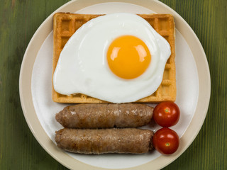 Fried Egg and Sausages on Waffles