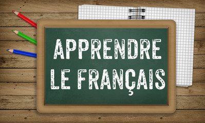 Learn French language, chalk on green board, education concept