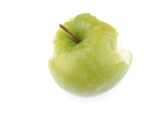 bitten green apple on a white background