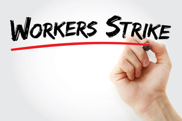 Hand writing Workers strike with marker, concept background