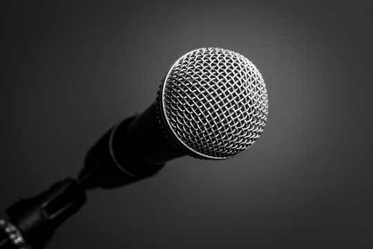 Microphone on black background, close-up