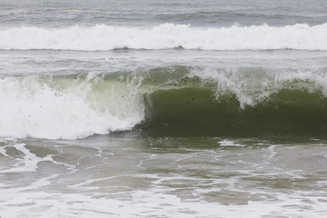 Closeup image of a waves about to crash.