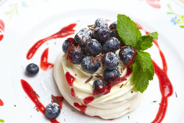 Meringue cake Pavlova with blueberry