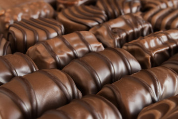 Mix of tasty chocolate candies - close up image.