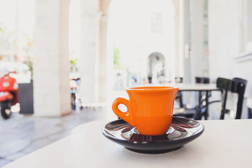 A cup of coffee on table outdoor
