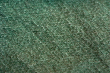 abstract texture of green wet material