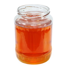 jar of honey on white background