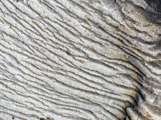 Wave-Like Textured Gray Rock Surface