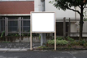  Large blank billboard on a street wall,  banners with room to add your own text