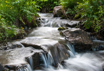 Water stream flowing on the rocks