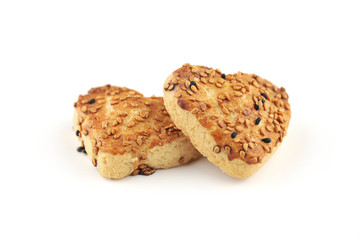 Heart-shaped salted cookie on white background