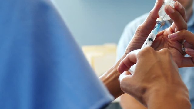 Series with doctors and patients in an exam room...Shot in 4K on the Lumix FZ1000.