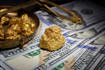 nugget gold and dollar bills