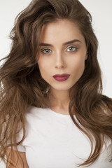 Naklejka premium Beautiful Brunette Girl with hairstyle and make up