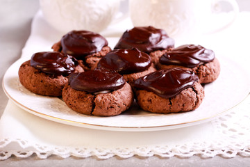 Chocolate surprise cookies with marshmallow filling on plate